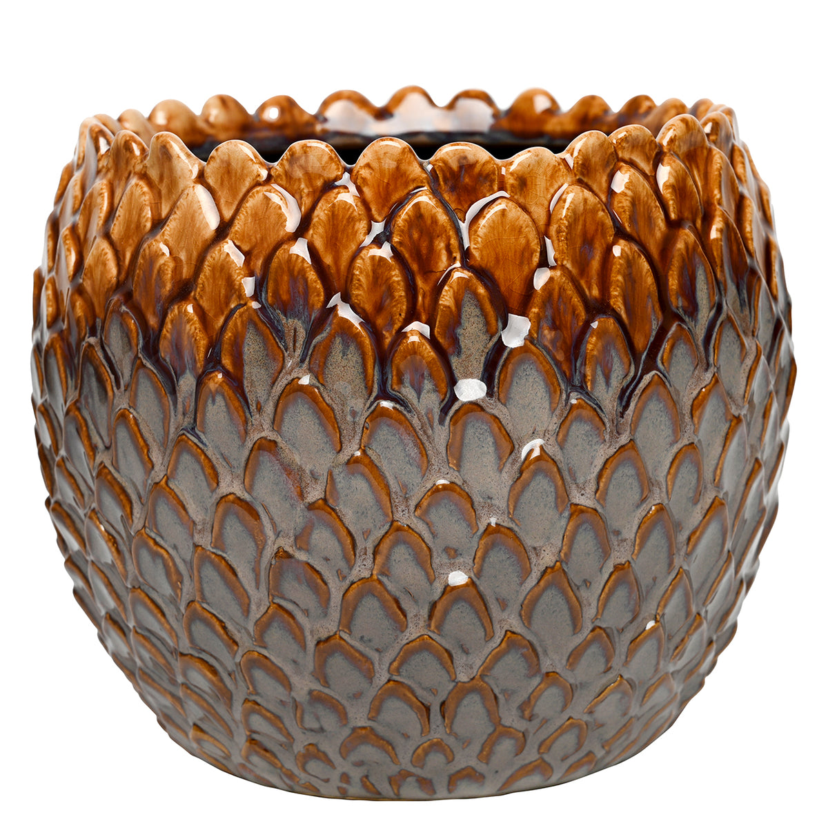 Small rounded planter with raised overlapping scales, amber upper glaze and charcoal-grey lower body on a white background.