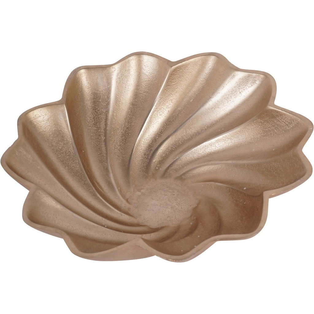 Overhead view of the decorative bowl showing its shell-like spiral and scalloped outline.
