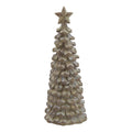 Full view of a beige-brown standing tree ornament with overlapping scalloped tiers and a five-pointed star against white.