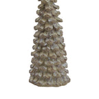 Detail of the tree ornament’s lower tiers and broad base, showing fine ridged lines and mottled scalloped edges.
