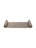 Front view of the antique gold tray with a flat rectangular centre and curled scroll ends against white.