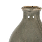 Close-up of the vase neck and flared lip, with glossy grey crackle glaze and irregular dark patches along the rim.