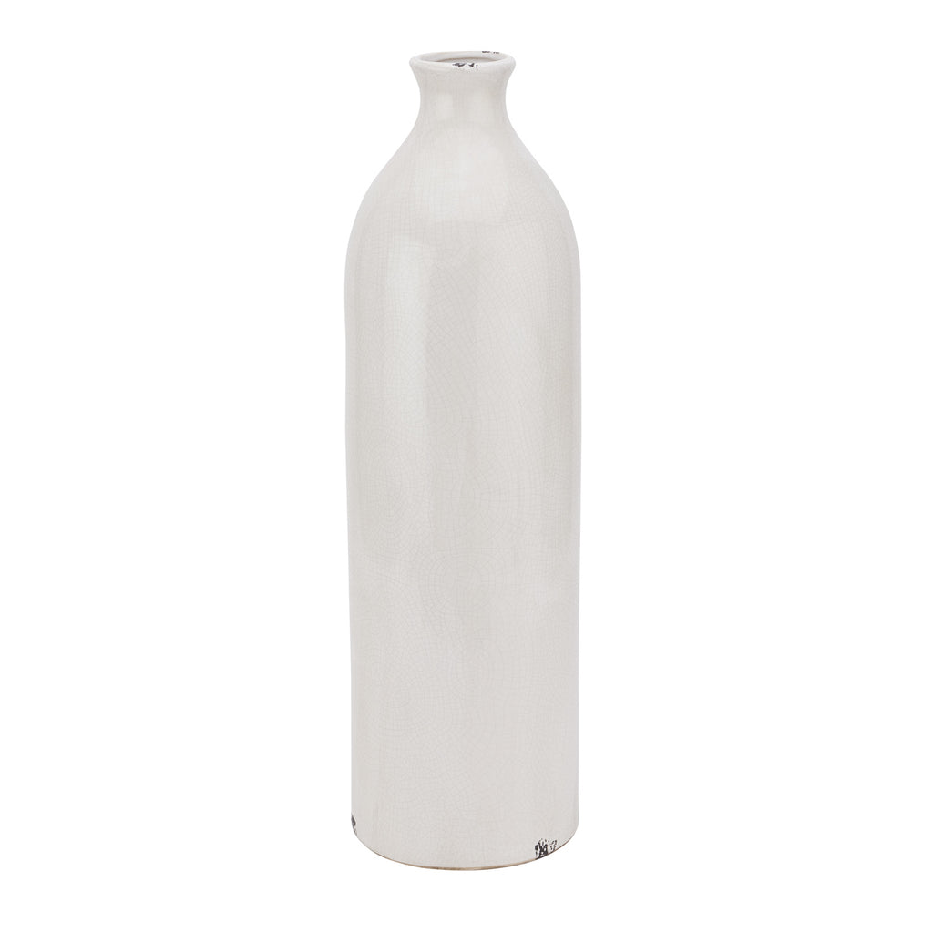 Tall off-white bottle-shaped vase with straight sides, rounded shoulders and small dark marks at the rim and base.