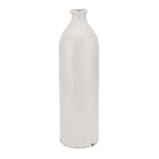 Tall off-white bottle-shaped vase with straight sides, rounded shoulders and small dark marks at the rim and base.