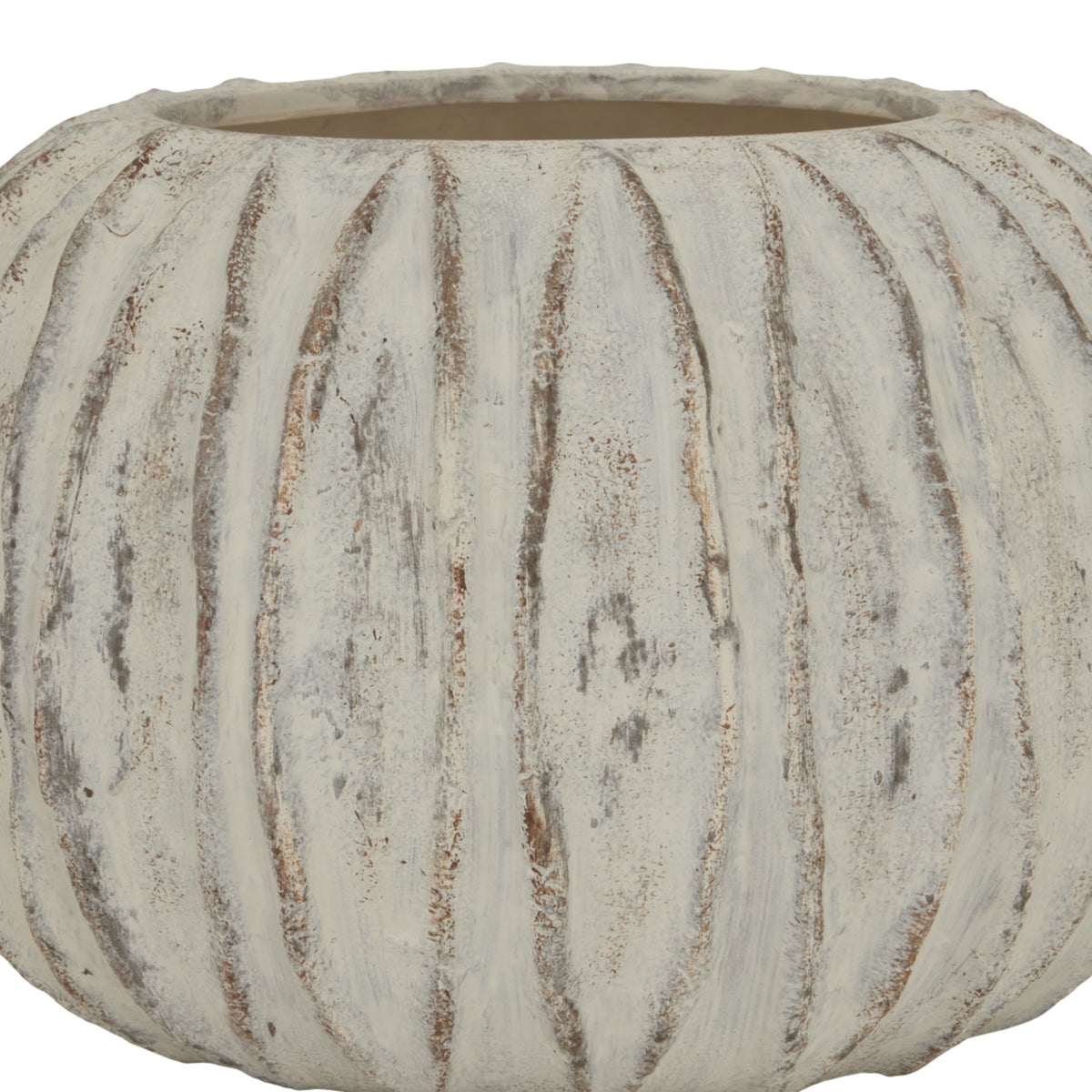 Front detail of the vase's broad ribs and mottled white finish, with the gently undulating rim visible above.