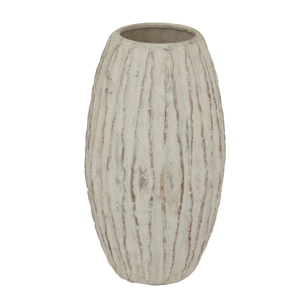 Pale oval Finrib vase with vertical raised ribs and a broad open mouth against a white background.