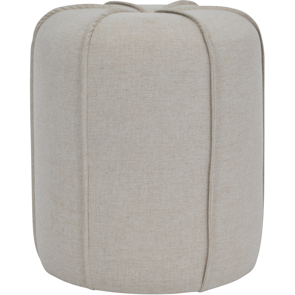 Front view of the round oatmeal footstool, with vertical piping running down its curved upholstered sides.