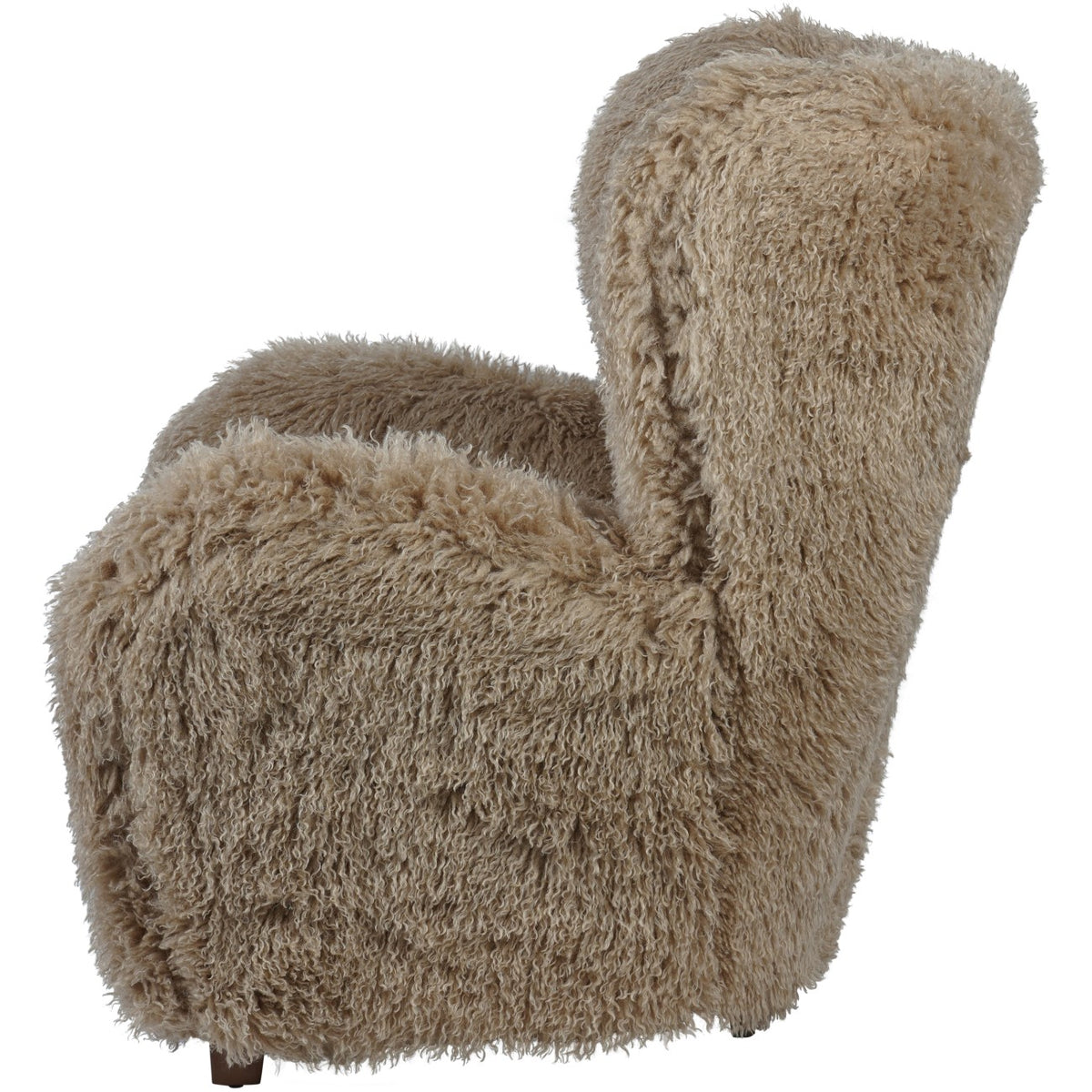 Side view of the beige imitation-fur armchair showing its curved back profile and fully upholstered side.