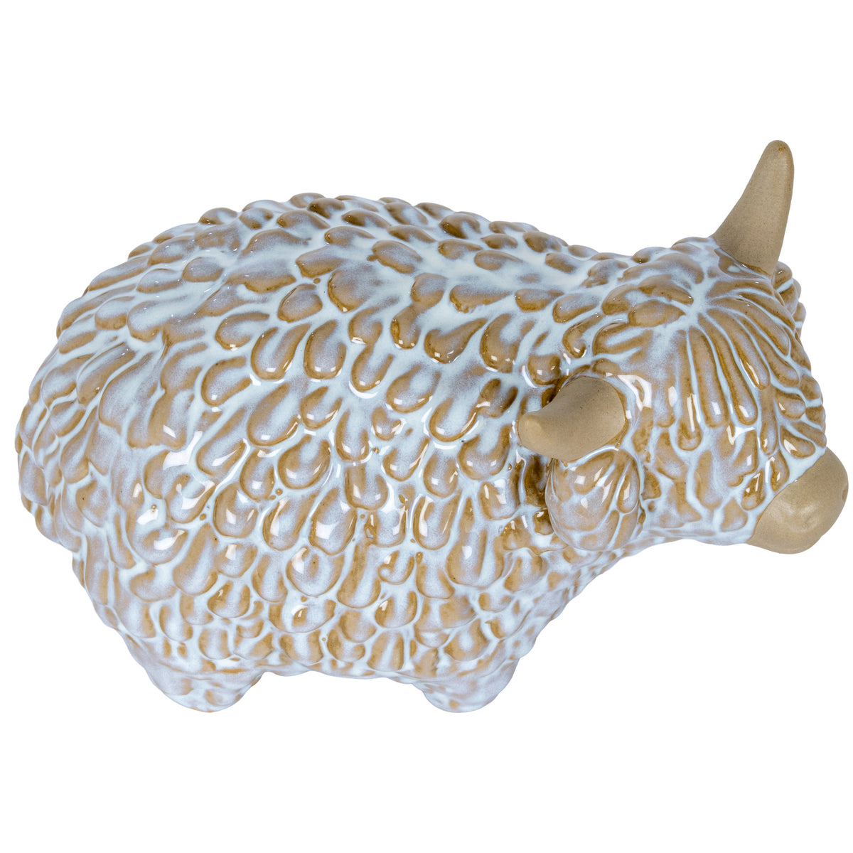 Side view of the rounded Highland cow ornament facing right, showing the raised strands of its glossy coat.