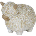 Three-quarter front view of a rounded white Highland cow ornament with beige horns and muzzle, a shaggy textured coat and short feet.