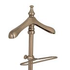 Angled view of the valet stand's shoulder hanger and oval double-rail frame around the central post.