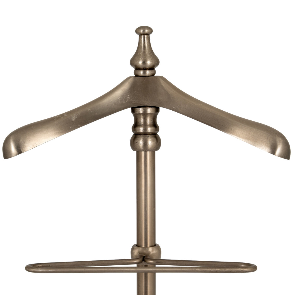 Front close-up of the valet stand's broad curved shoulder hanger, shaped finial and double-rail frame below.