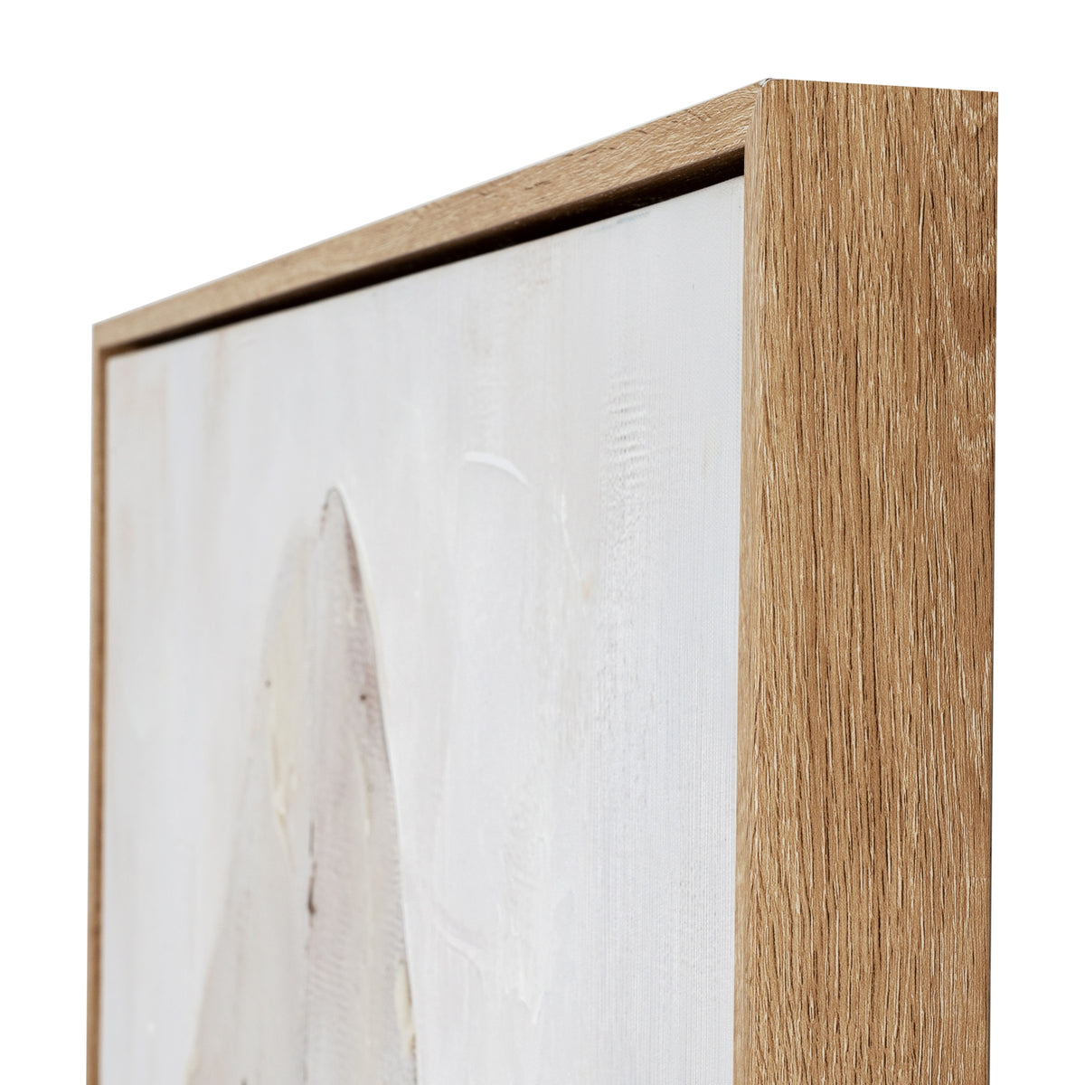 Angled view of the upper right frame corner, with a warm brown grain pattern and the pale leaf artwork visible behind it.