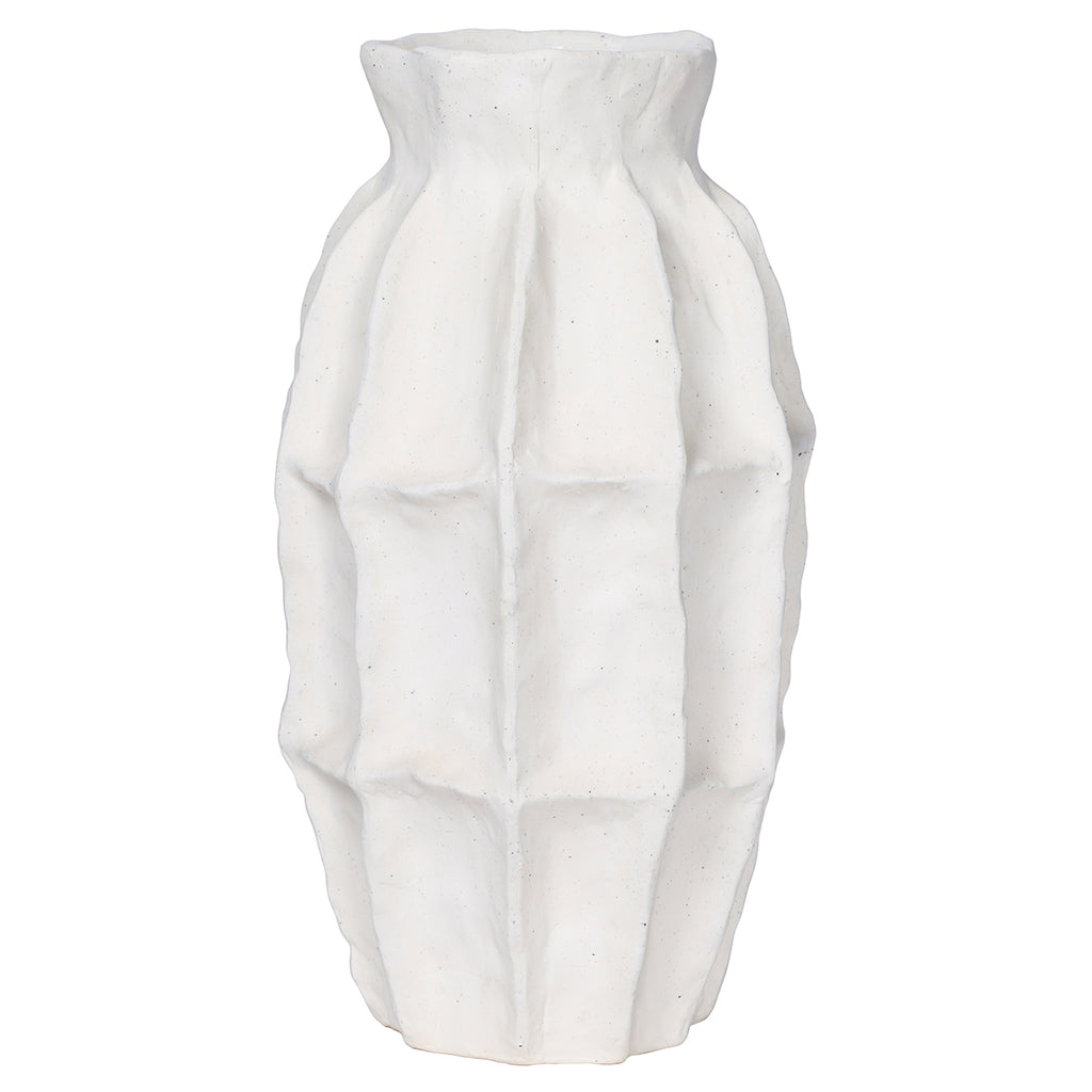 Front view of the slender white vase with softly panelled sides and a gently uneven rim.
