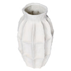 Angled view from above showing the white vase's open neck and rounded panelled body.