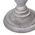 Close-up of the stepped round lamp foot with a rubbed white finish and darker grey-brown colour showing through.