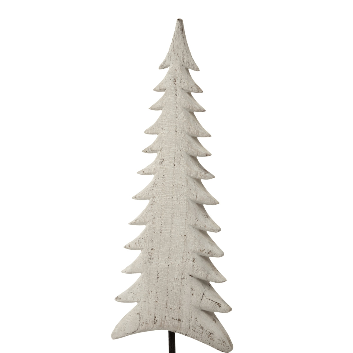 Close view of the pointed fir-tree outline, showing tiered branches and darker marks across the textured white finish.