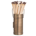 Rear view of a bronze-coloured cylindrical match holder with banded ends, a loop handle and long matches projecting from the top.