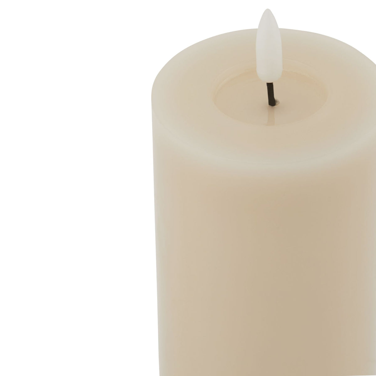 Close view of the candle's broad pale rim and recessed top surrounding a white flame-shaped insert.