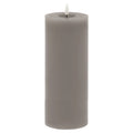 Full view of a tall grey LED pillar candle with smooth straight sides and a white flame-shaped insert above a recessed top.