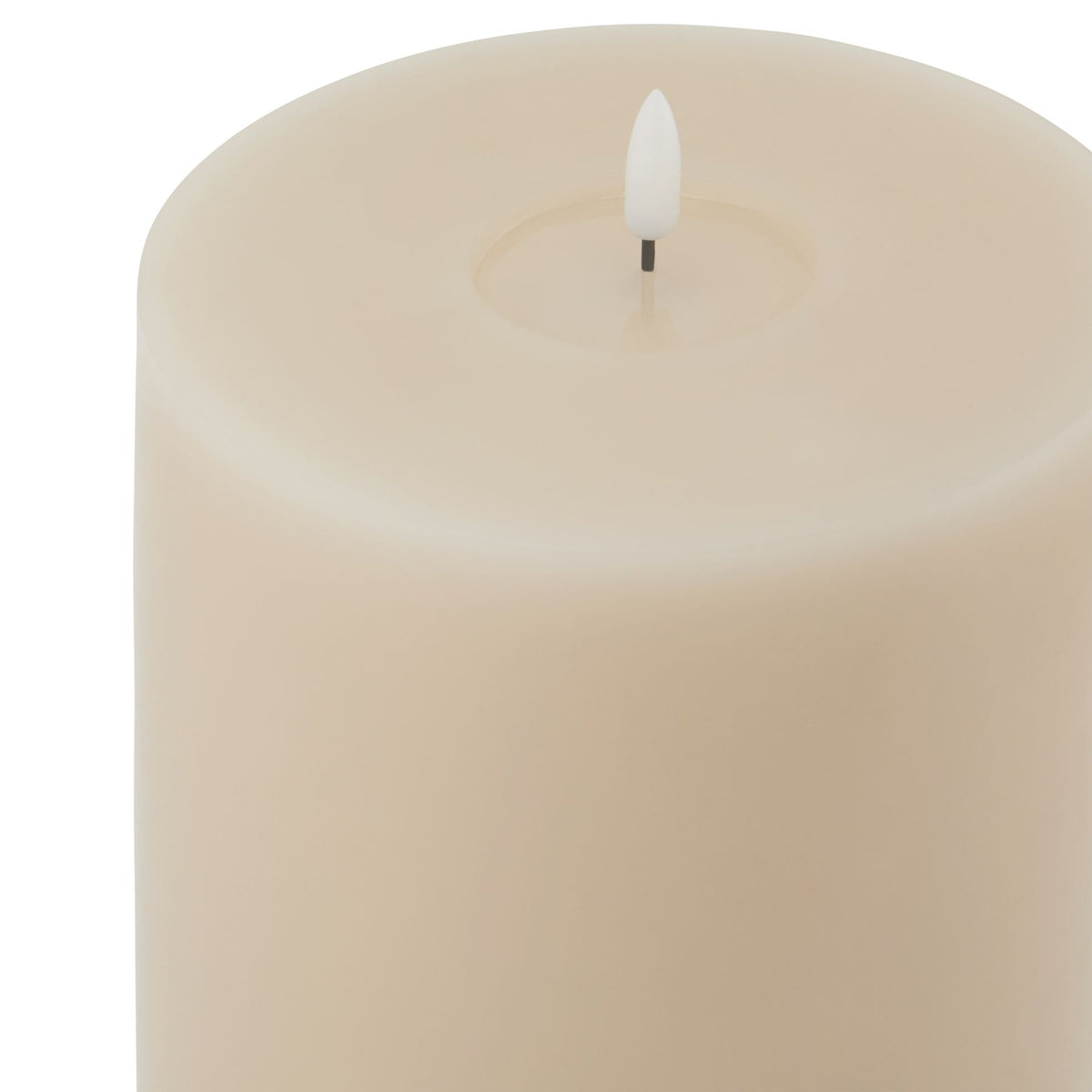 Close-up of the candle's broad circular rim and recessed centre surrounding a white flame-shaped insert on a short dark stem.