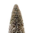 Close-up of the decorative tree's rounded tip and tapered cone, showing uneven off-white flocking across the brown bristles.