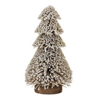 Full view of a four-tier pale brown brush tree covered in off-white snowy flocking, standing on a round brown base.