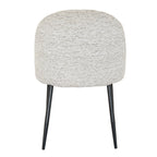 Rear view of the dining chair showing its broad rounded pale back and slim black legs against a white background.