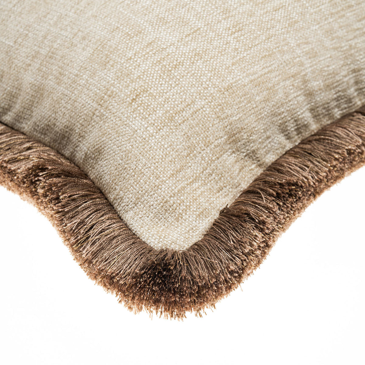 Close-up of the neutral Sorelle Lumbar Cushion with brown fringe
