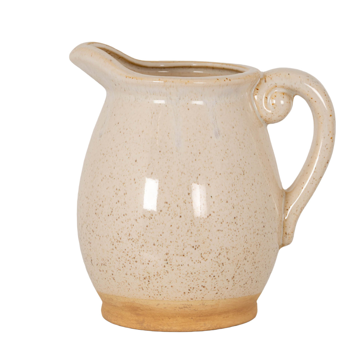 Cream decorative jug with brown speckles, a rounded body, pouring lip on the left, curled loop handle on the right and an ochre-coloured base band.