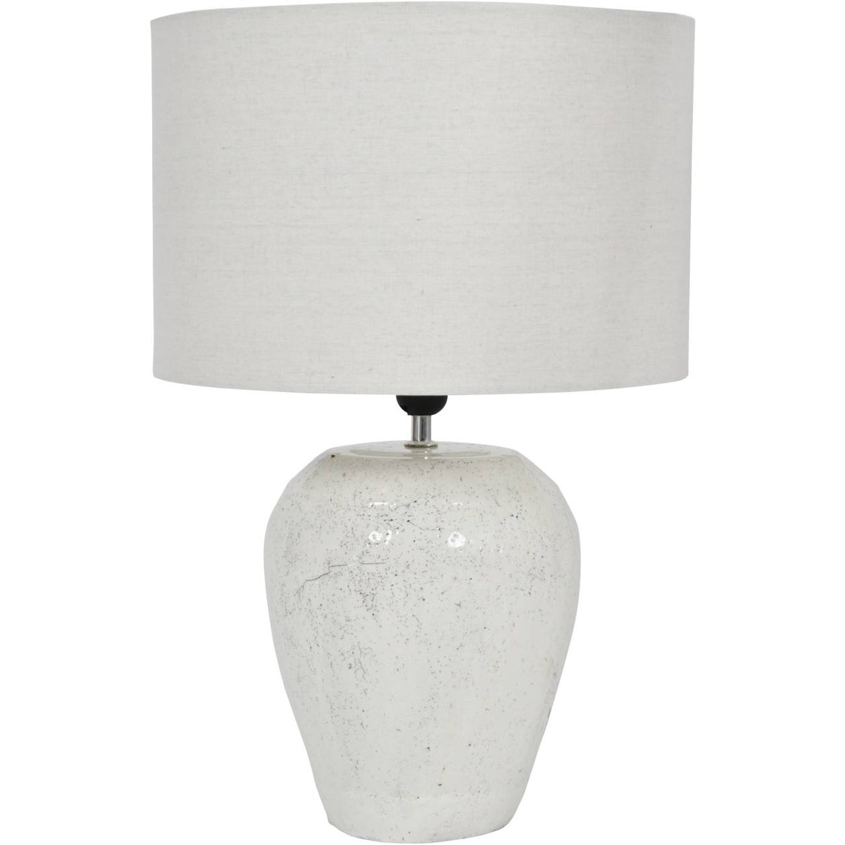 Front view of the table lamp with a rounded white speckled base and wide neutral linen drum shade.
