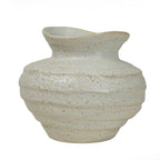 Front view of a rounded ivory ceramic vase with brown speckles, textured horizontal bands and an uneven flared rim.