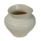Angled view of the ceramic vase showing its wide opening, speckled interior and textured rounded shoulders.
