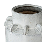 Angled close-up into the vase's open neck, showing the dark speckled interior, glossy rim and upright shoulder fins.