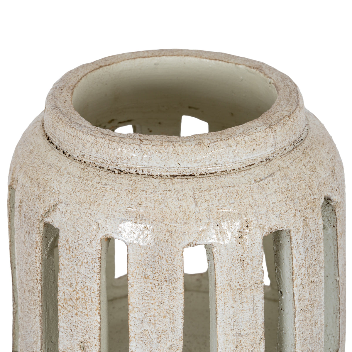 Angled close-up of the candle holder's open top, showing its raised rim, speckled white finish and the upper ends of the vertical slots.