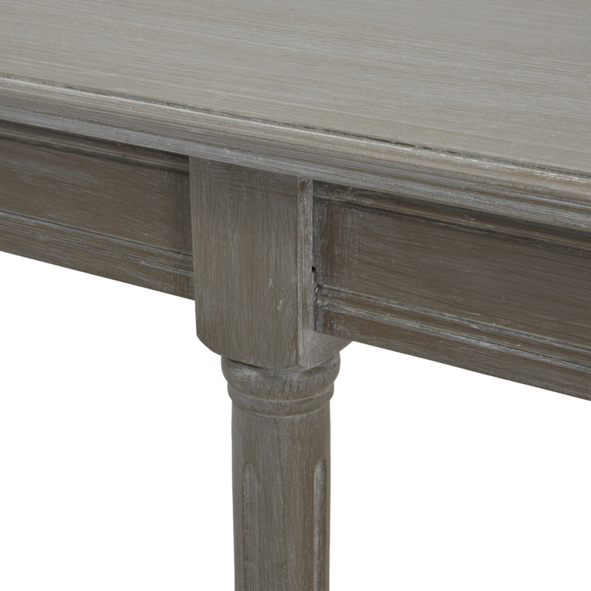 Close-up of the console's grey tabletop edge, moulded apron and the ringed detail at the top of a leg.