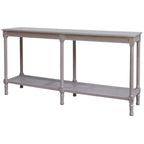 Grey console table shown at an angle on a white background, with a long rectangular top, six slender legs and woven lower shelves.