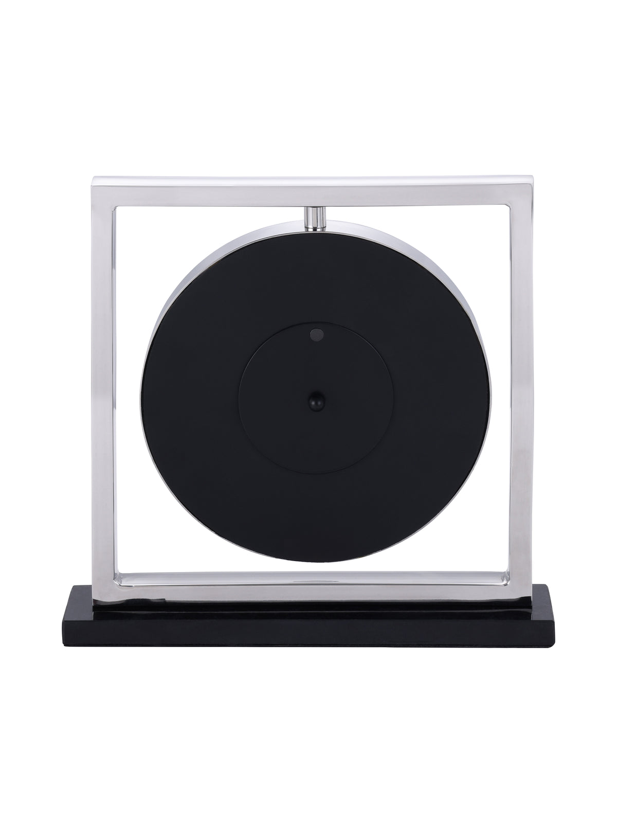 Rear view of the mantel clock with a black circular back inside the silver square frame.