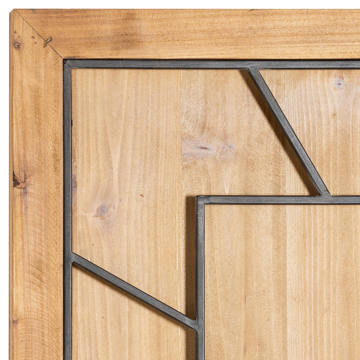 Close-up of the clock's upper-left corner, showing the honey-brown surround, grain-patterned face and dark numeral framework.