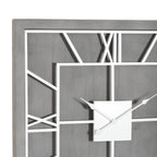 Close-up of the clock's grey wood-look texture, white numeral framework and square centre beneath the decorative hands.