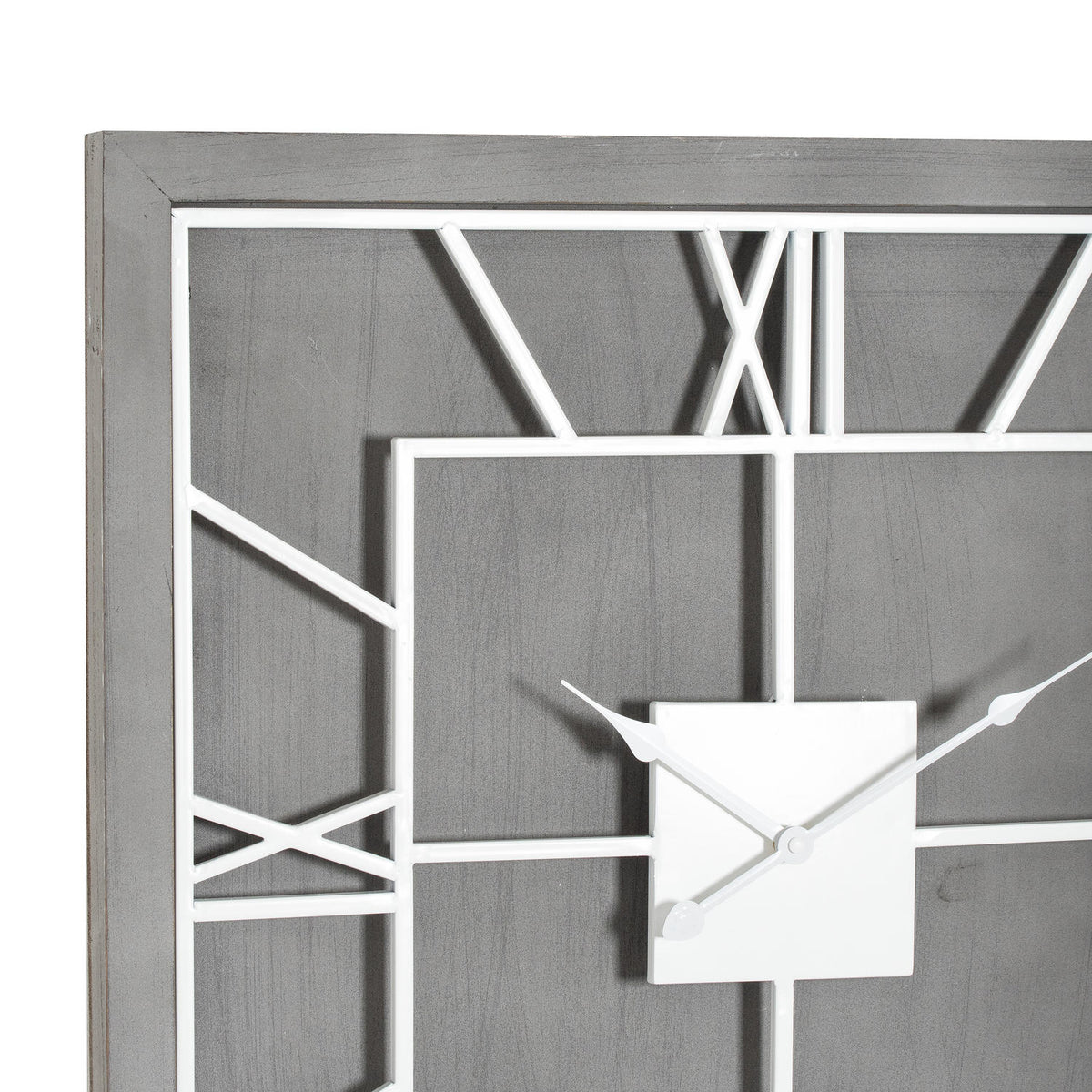 Close-up of the clock's grey wood-look texture, white numeral framework and square centre beneath the decorative hands.