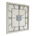 Angled view of a square whitewashed wall clock with a light-grey open numeral framework and ornate hands.