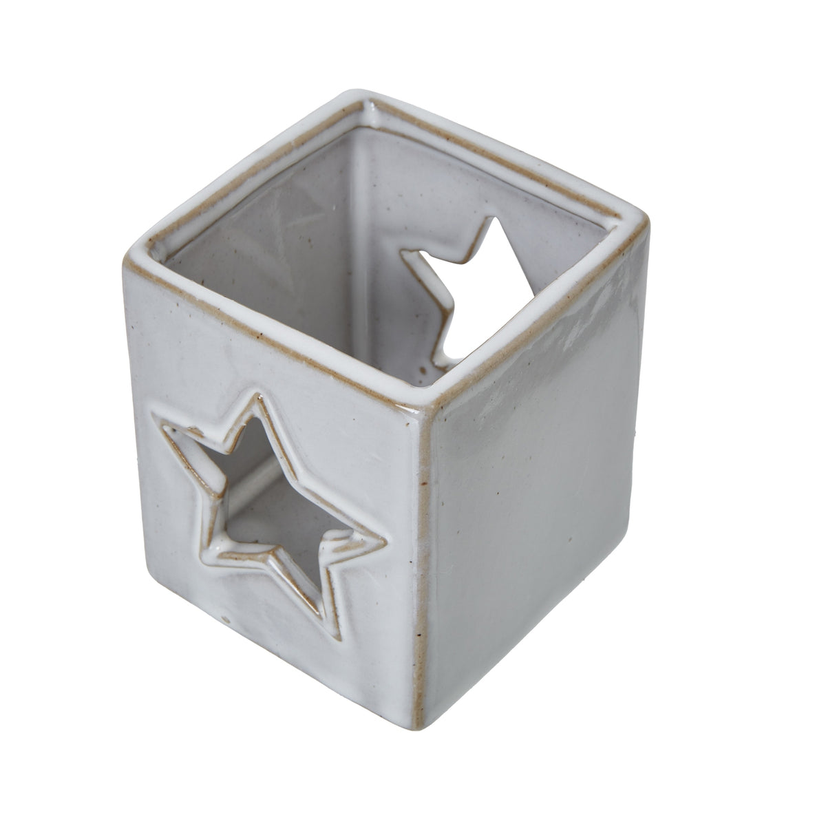 View from above into the square candle holder, showing its speckled interior, tan-edged rim and opposing star openings.