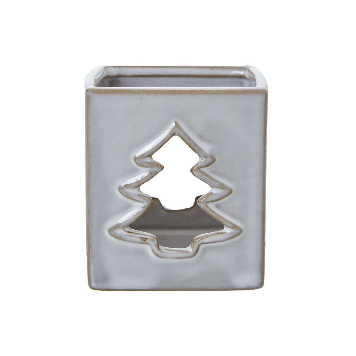 Front view of the off-white square candle holder with a tan-edged tree cut-out and open top.