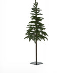 Green artificial woodland Christmas tree with sparse branches, a long brown trunk and a dark square base against white.