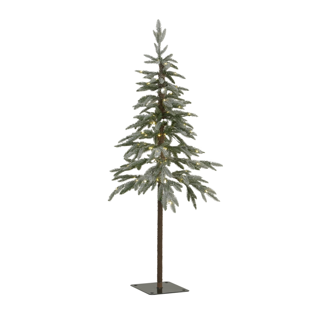 Snow-dusted artificial Christmas tree shown with small yellow-toned lights glowing among the green branches, above a brown trunk and dark square base.