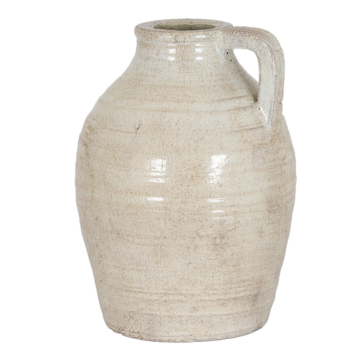 Pale cream decorative jug with beige mottling, a rounded body and a squared loop handle on the right.