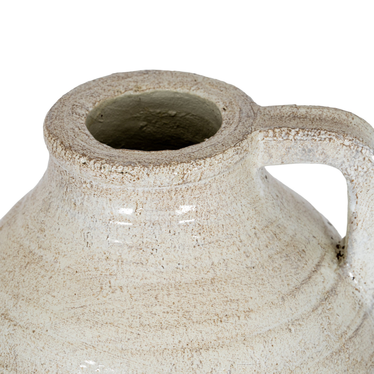 View from above of the jug's open neck, thick mottled rim and upper handle.