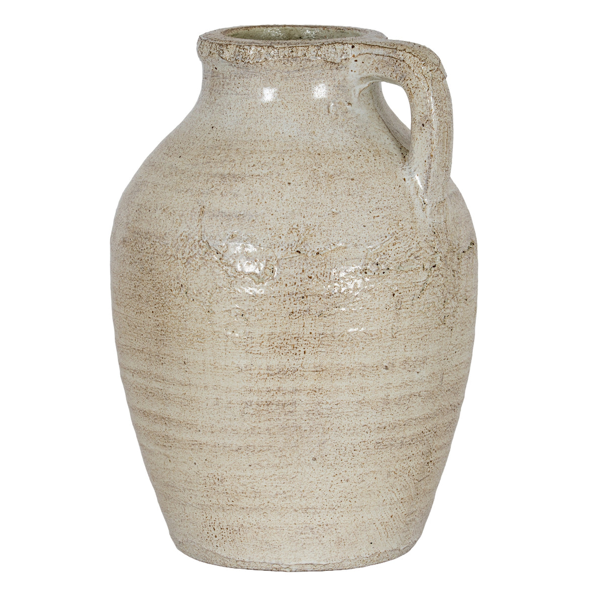 Pale cream decorative jug with warm brown mottling, a rounded shoulder, tapered body and squared loop handle on the right.