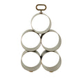 Straight-on view of the empty wine rack with five circular holders stacked beneath a loop handle.